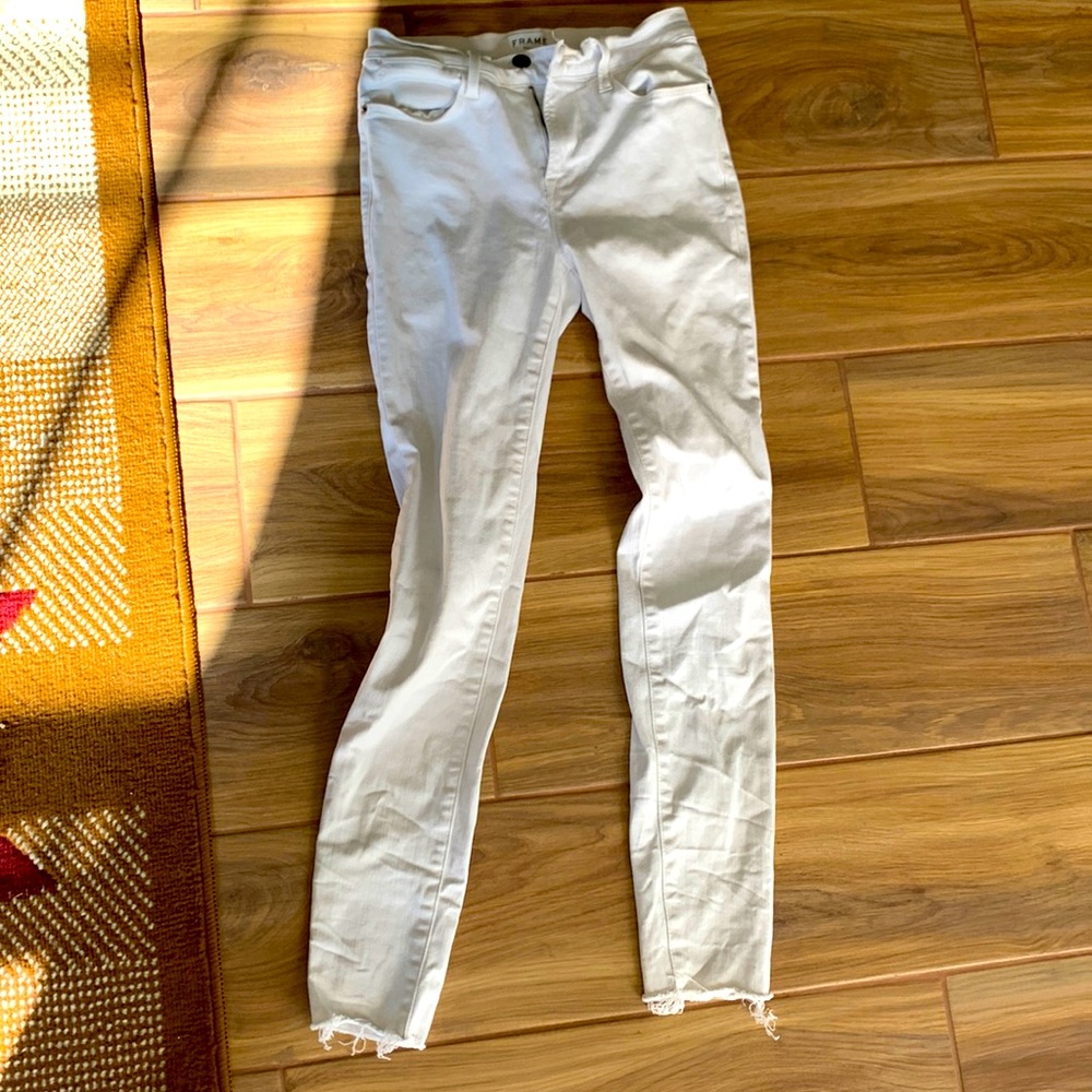 White frame jeans